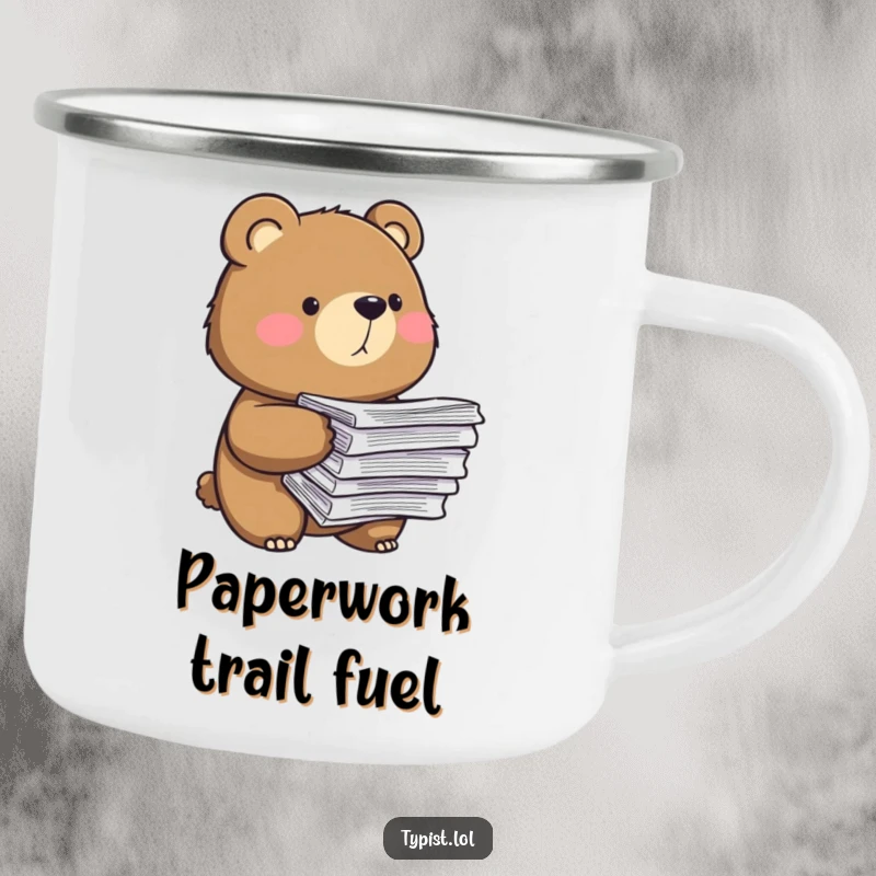 Funny camping mug showing a determined bear with a large stack of papers, representing perseverance on outdoor adventures.