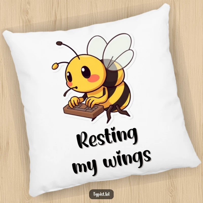 Funny bee pillow with a busy bee typing rapidly on a keyboard, using its tiny stinger, looking focused.