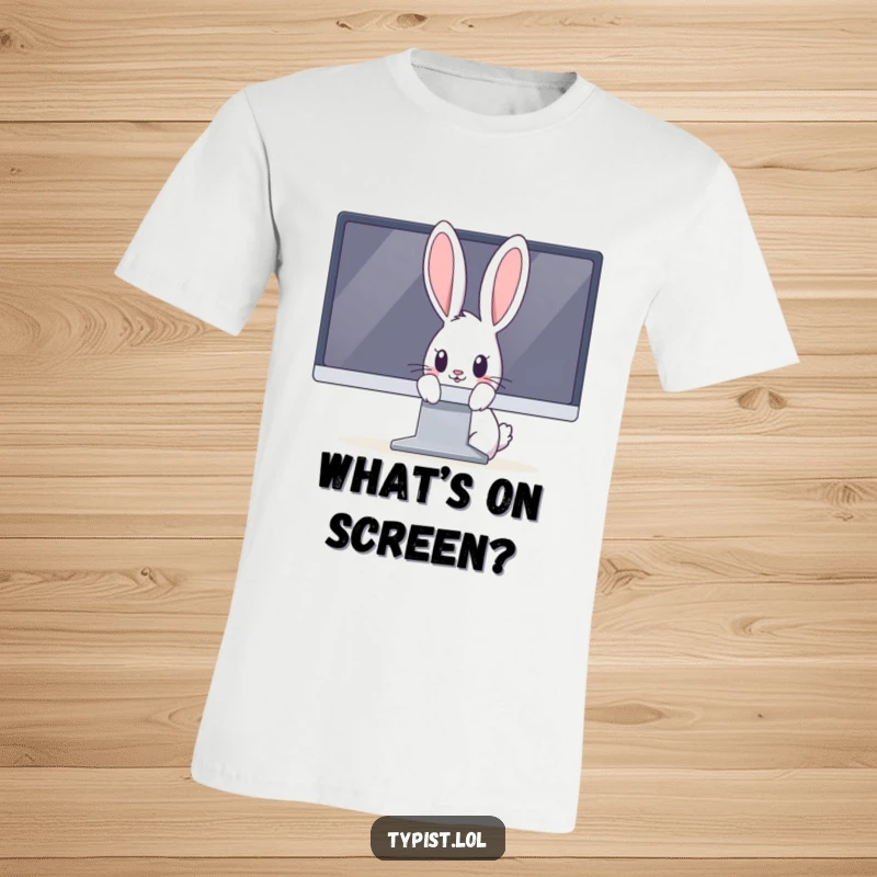 Funny rabbit t-shirt showing a curious bunny peeking its head from behind a giant computer monitor, full of wonder.